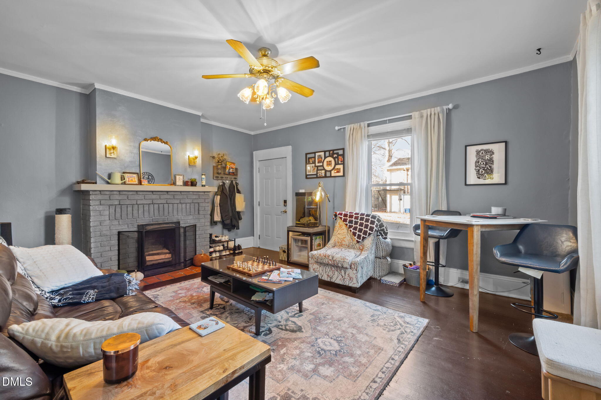 813 Arnette Avenue Durham, NC 27701 - Photo 6 of 31 a living room with furniture and a fireplace
