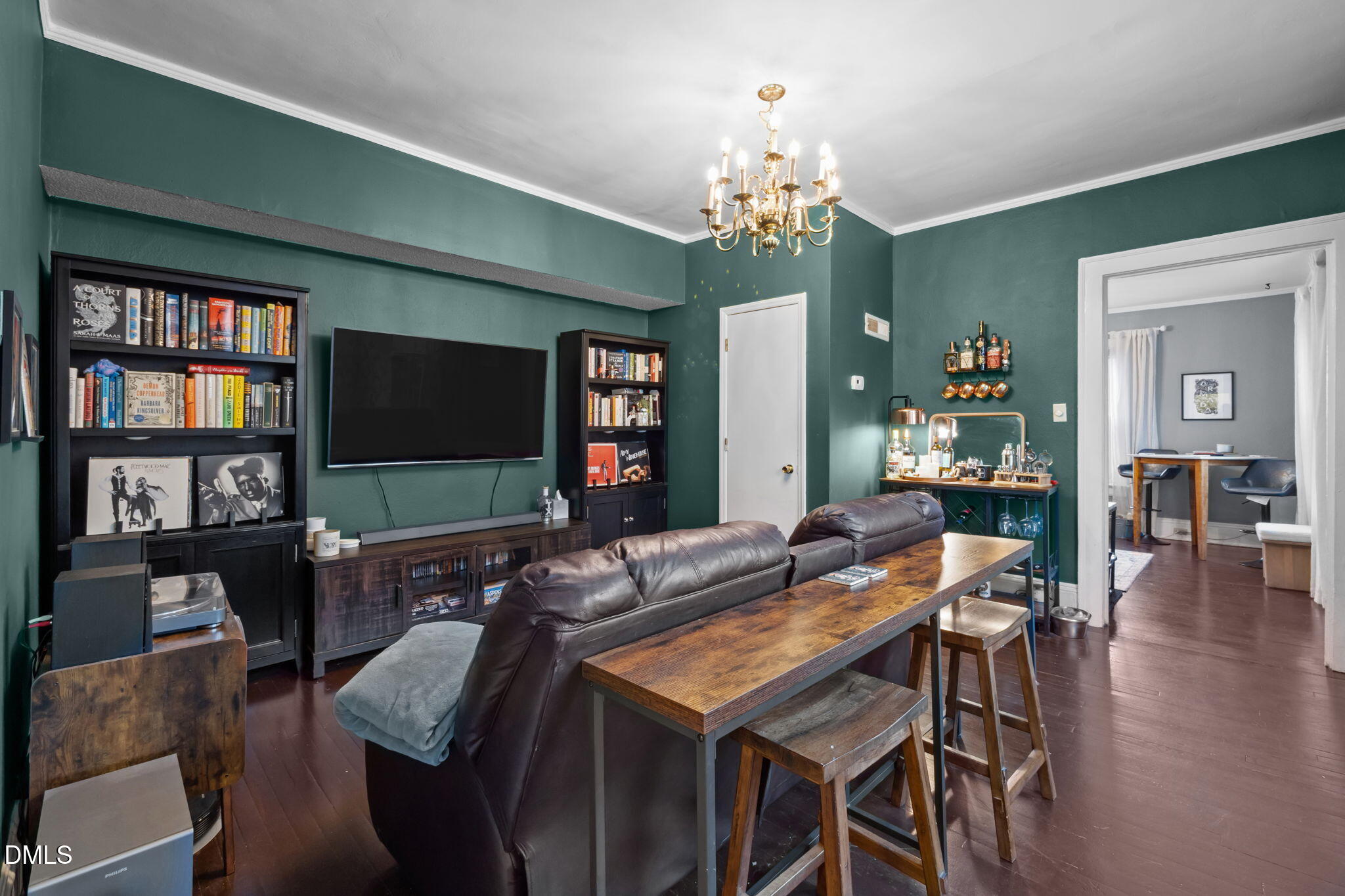 813 Arnette Avenue Durham, NC 27701 - Photo 9 of 31 a view of a dining room with furniture and a chandelier