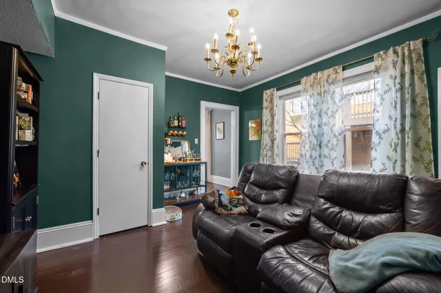 a bathroom with a sink mirror and toilet