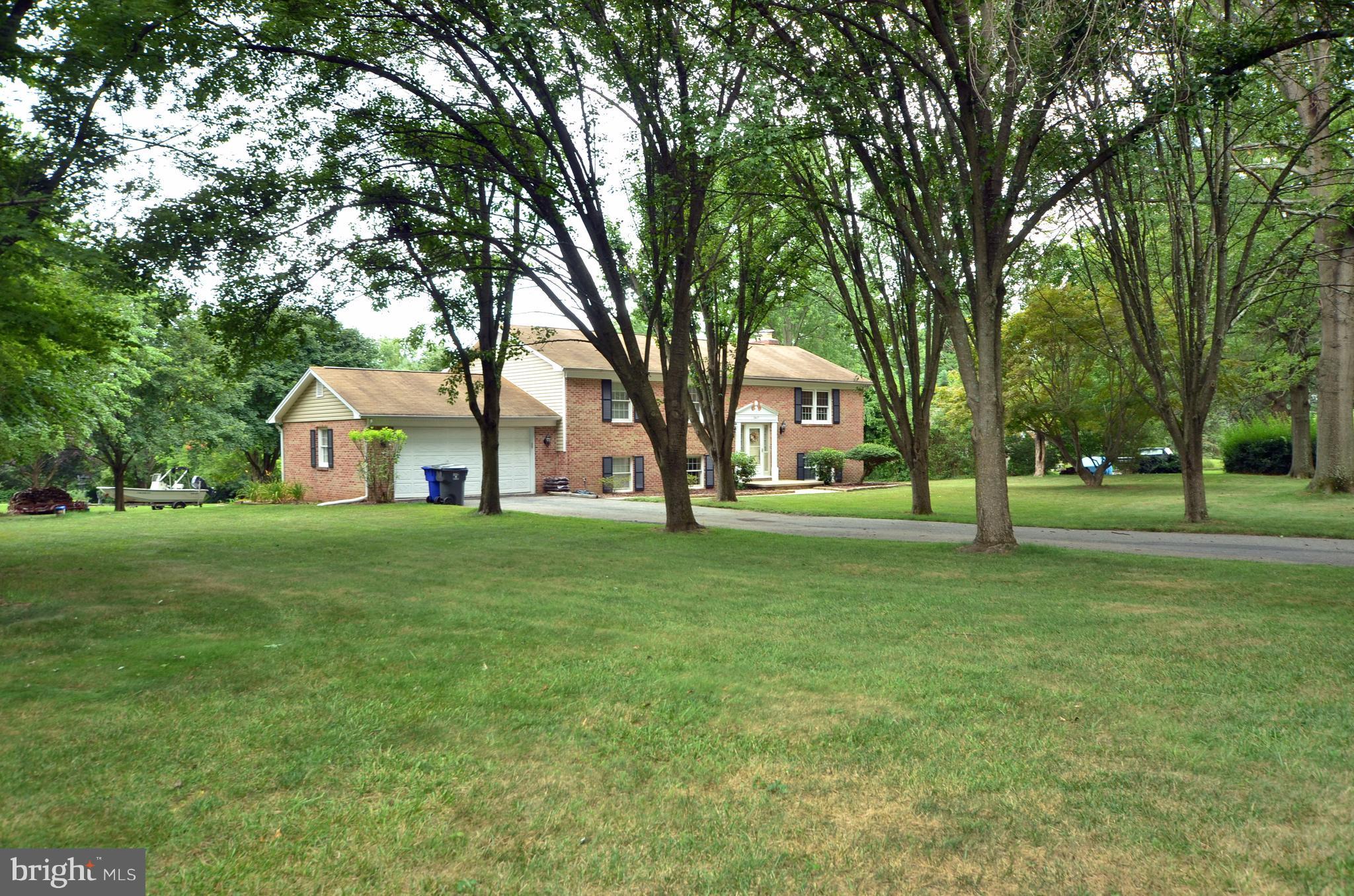 2417 Houcks Mill Road Monkton, MD 21111 - Photo 2 of 26 Tree-lined driveway