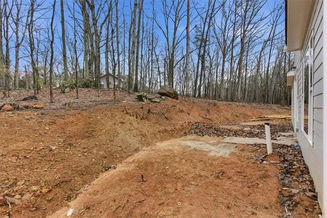 a house with trees in the background