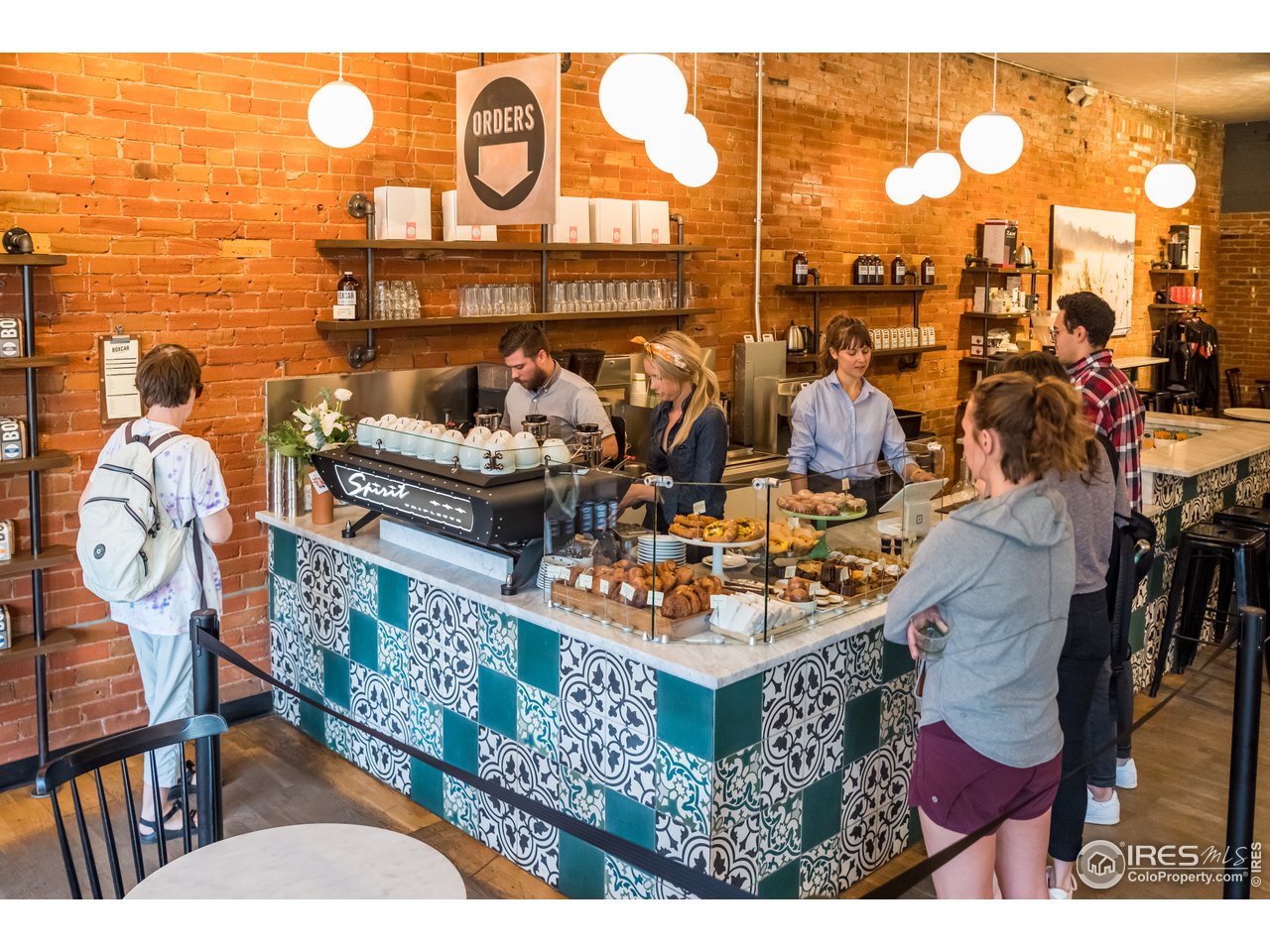 2718 Pine Street, Unit 302 Boulder, CO 80302 - Photo 23 of 24 a picture of a table with chairs
