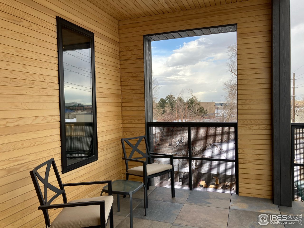 2718 Pine Street, Unit 302 Boulder, CO 80302 - Photo 4 of 24 a view of a couple of chairs in balcony