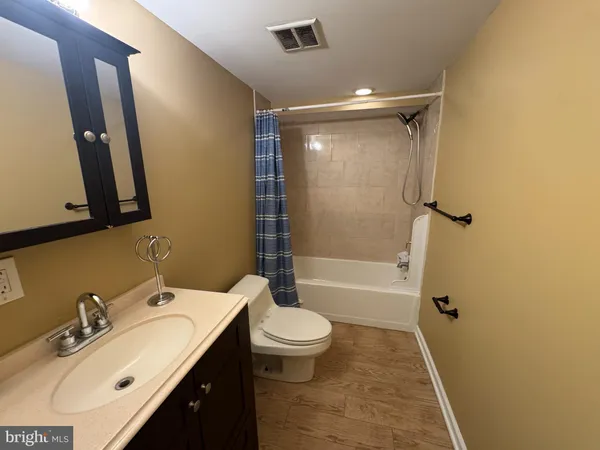 a view of a house with wooden stairs