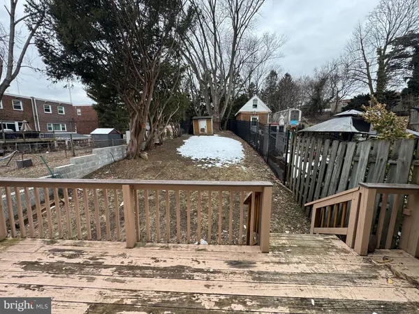 a view of a deck with a bench