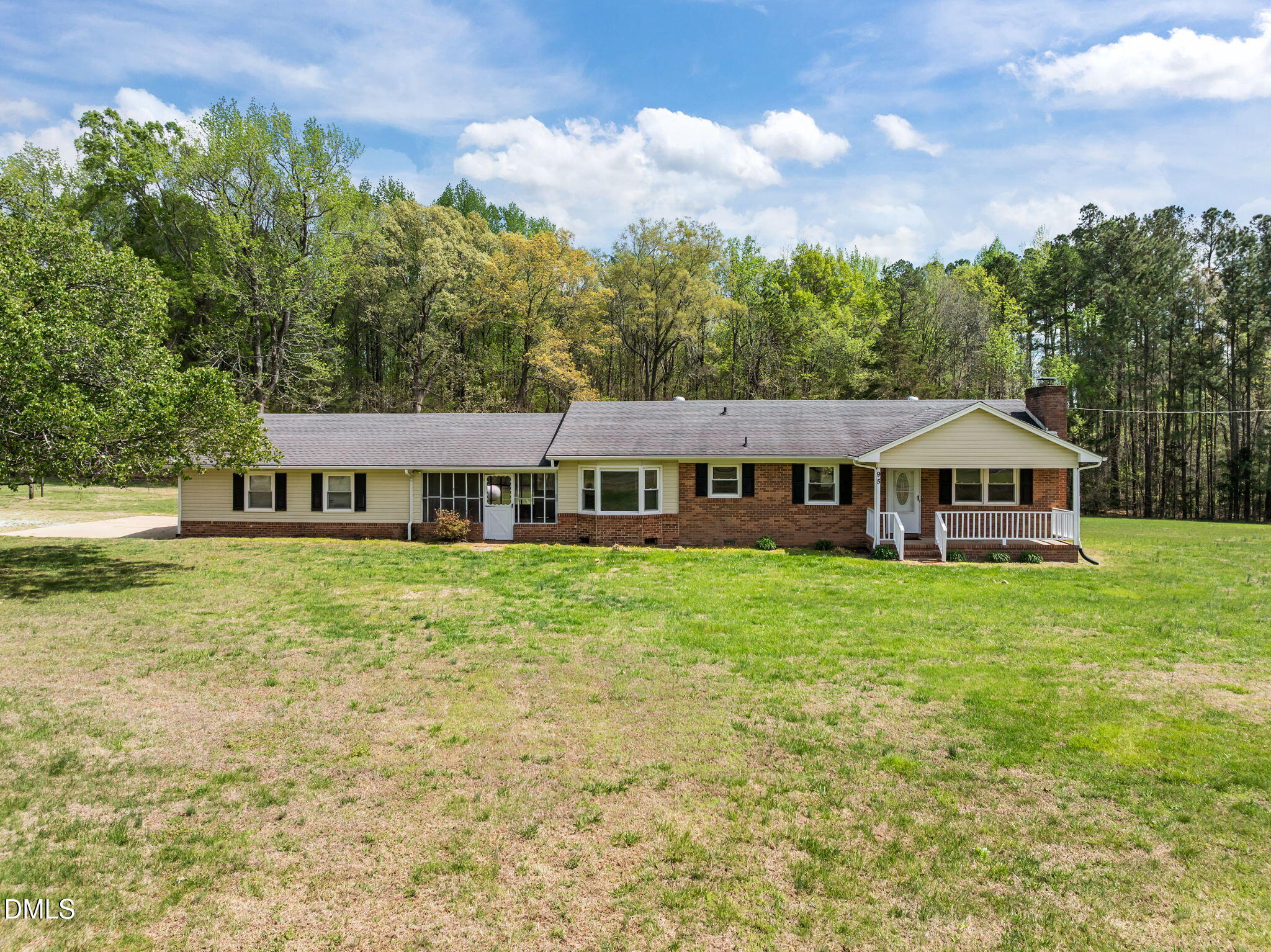 95 Harold Gill Road Roxboro, NC 27574 - Photo 41 of 53 a front view of a house with garden