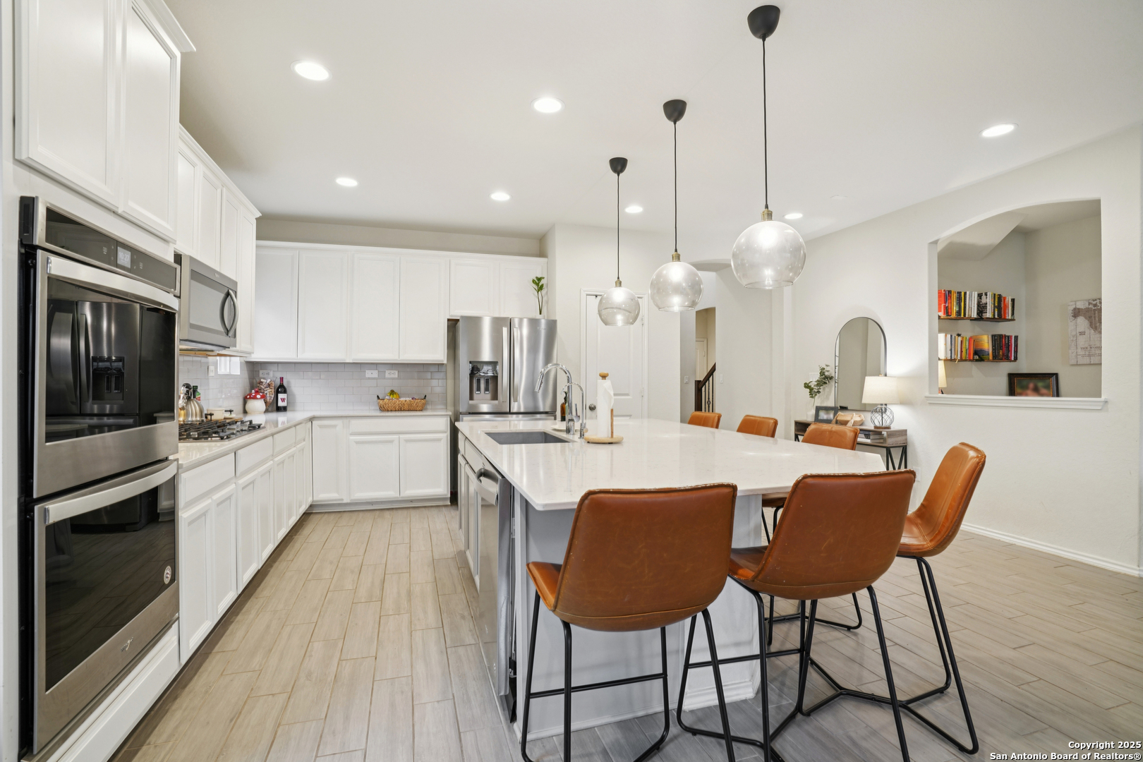 9028 Curling Post Schertz, TX 78154 - Photo 13 of 37 a large kitchen with kitchen island a large island in it