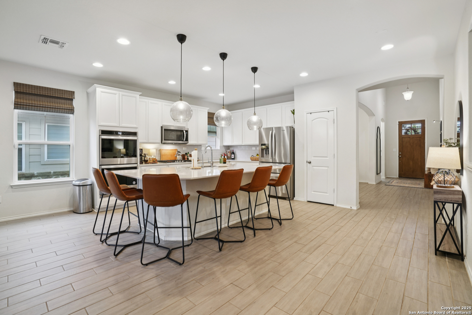 9028 Curling Post Schertz, TX 78154 - Photo 14 of 37 a view of a dining room with furniture window and wooden floor