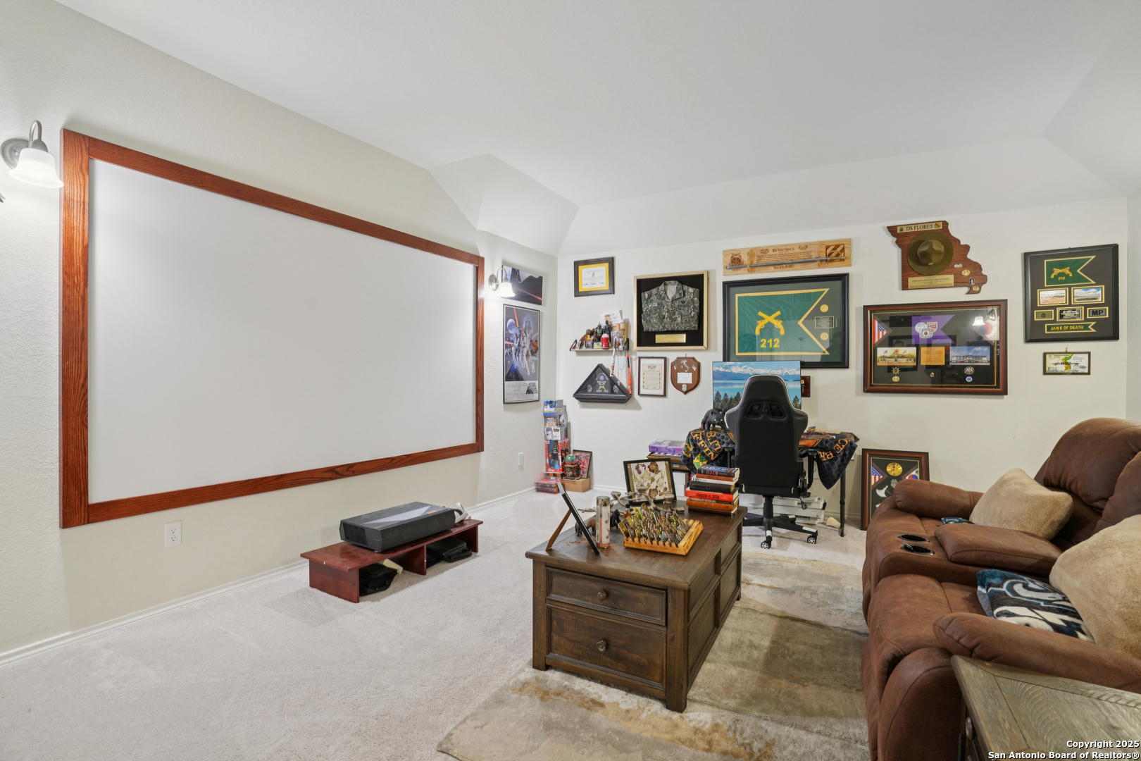9028 Curling Post Schertz, TX 78154 - Photo 25 of 37 a living room with furniture and a flat screen tv