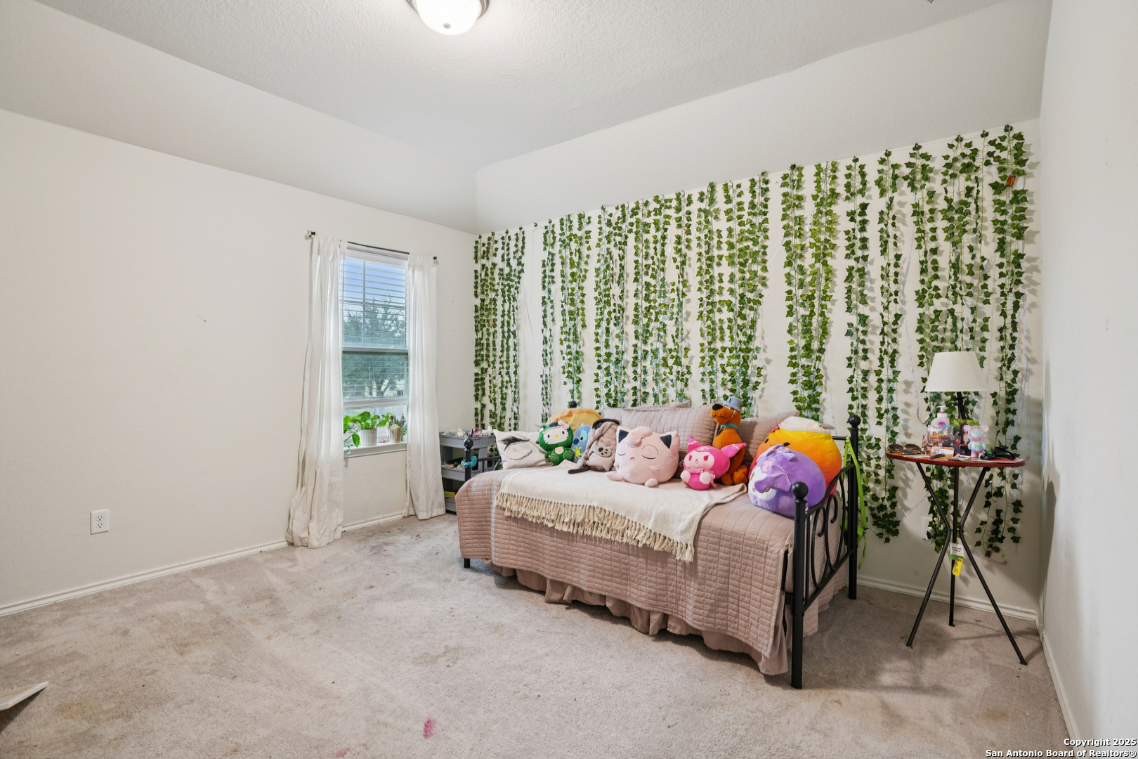 9028 Curling Post Schertz, TX 78154 - Photo 27 of 37 a bedroom with a bed and a window