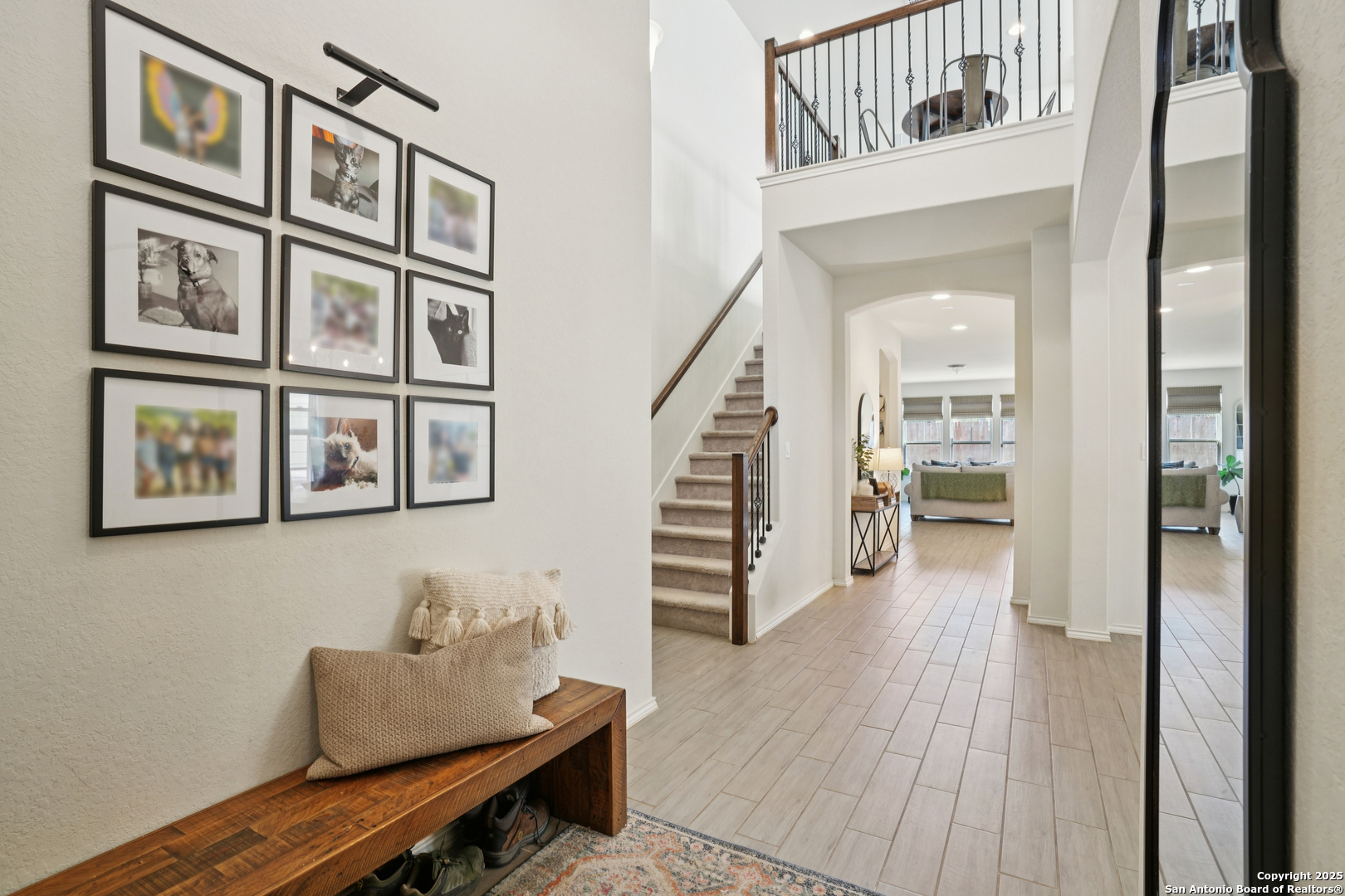 9028 Curling Post Schertz, TX 78154 - Photo 5 of 37 a hallway with furniture and wooden floor