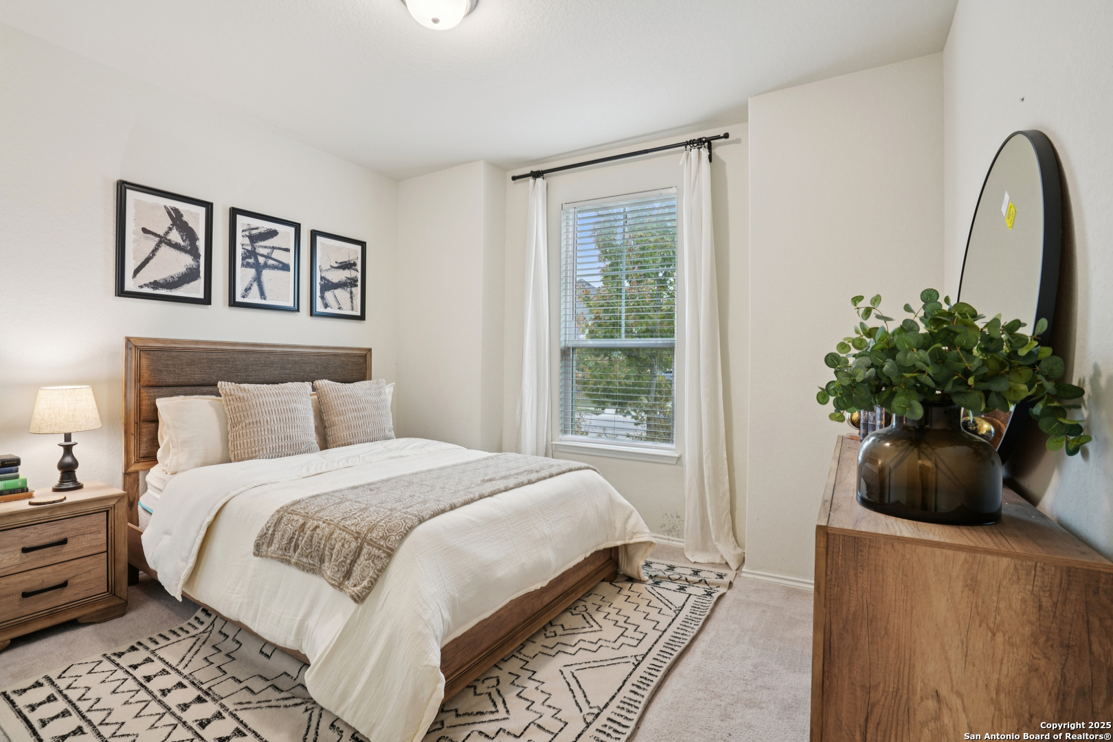 9028 Curling Post Schertz, TX 78154 - Photo 6 of 37 a bedroom with bed and a potted plant