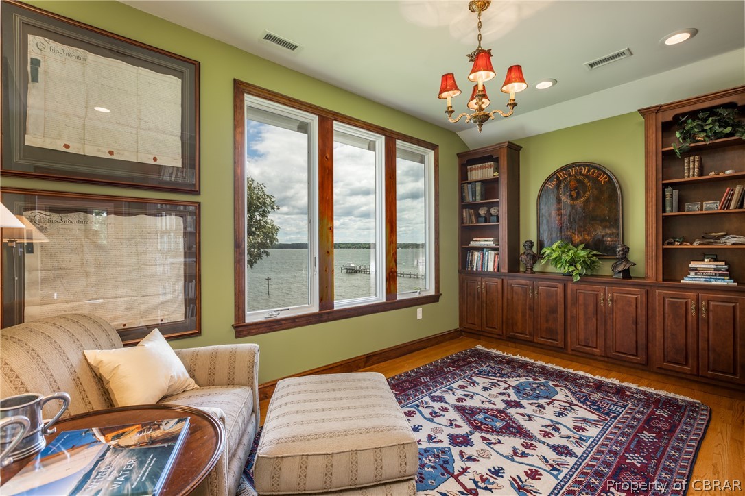 901 Oak Hill Road Lancaster, VA 22503 - Photo 40 of 49 a living room with furniture and a large window