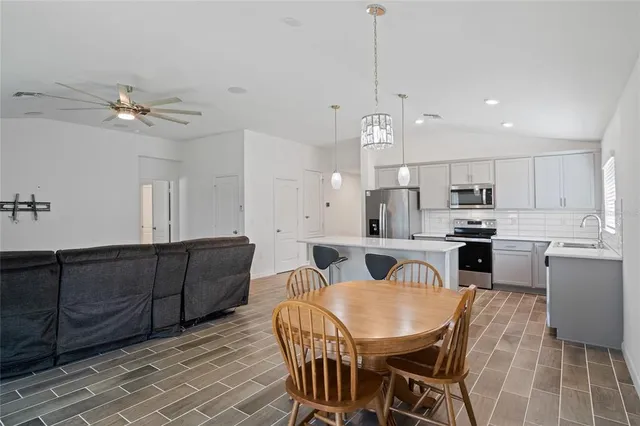 a view of kitchen with breakfast area