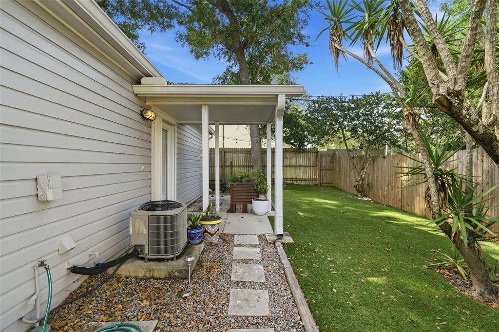 1408 East Ridgewood Street Orlando, FL 32803 - Photo 3 of 41 a view of a back yard of the house