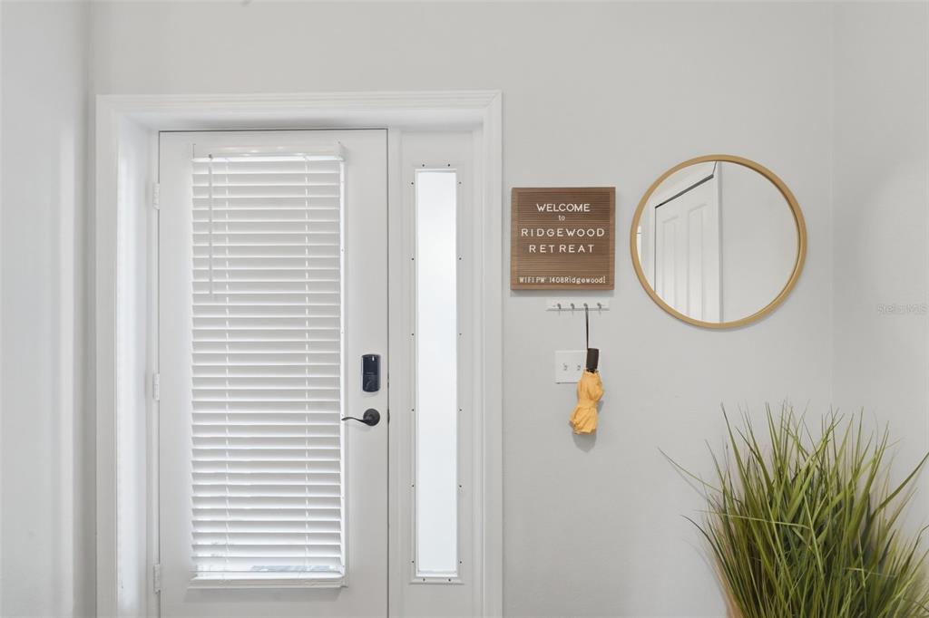 1408 East Ridgewood Street Orlando, FL 32803 - Photo 4 of 41 a front view of a house with garden