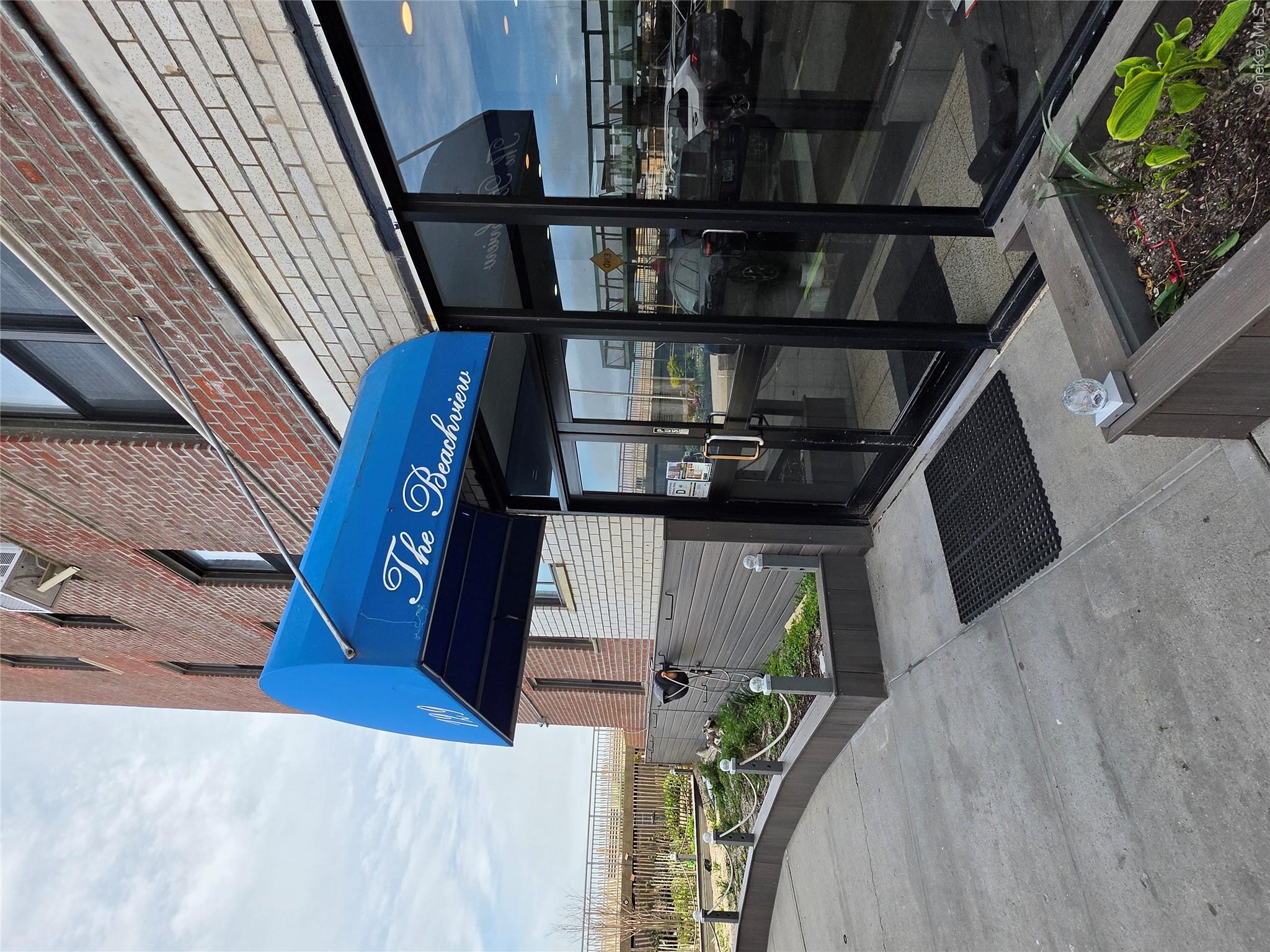 129 Beach 118th Street, Unit 5A Queens, NY 11694 - Photo 1 of 17 a view of a street with sitting area