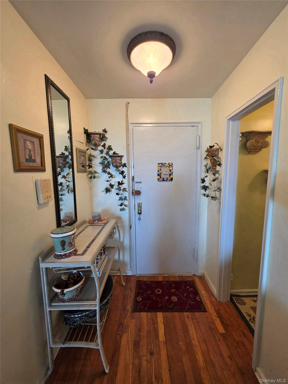 129 Beach 118th Street, Unit 5A Queens, NY 11694 - Photo 4 of 17 a bedroom with a bed and a window