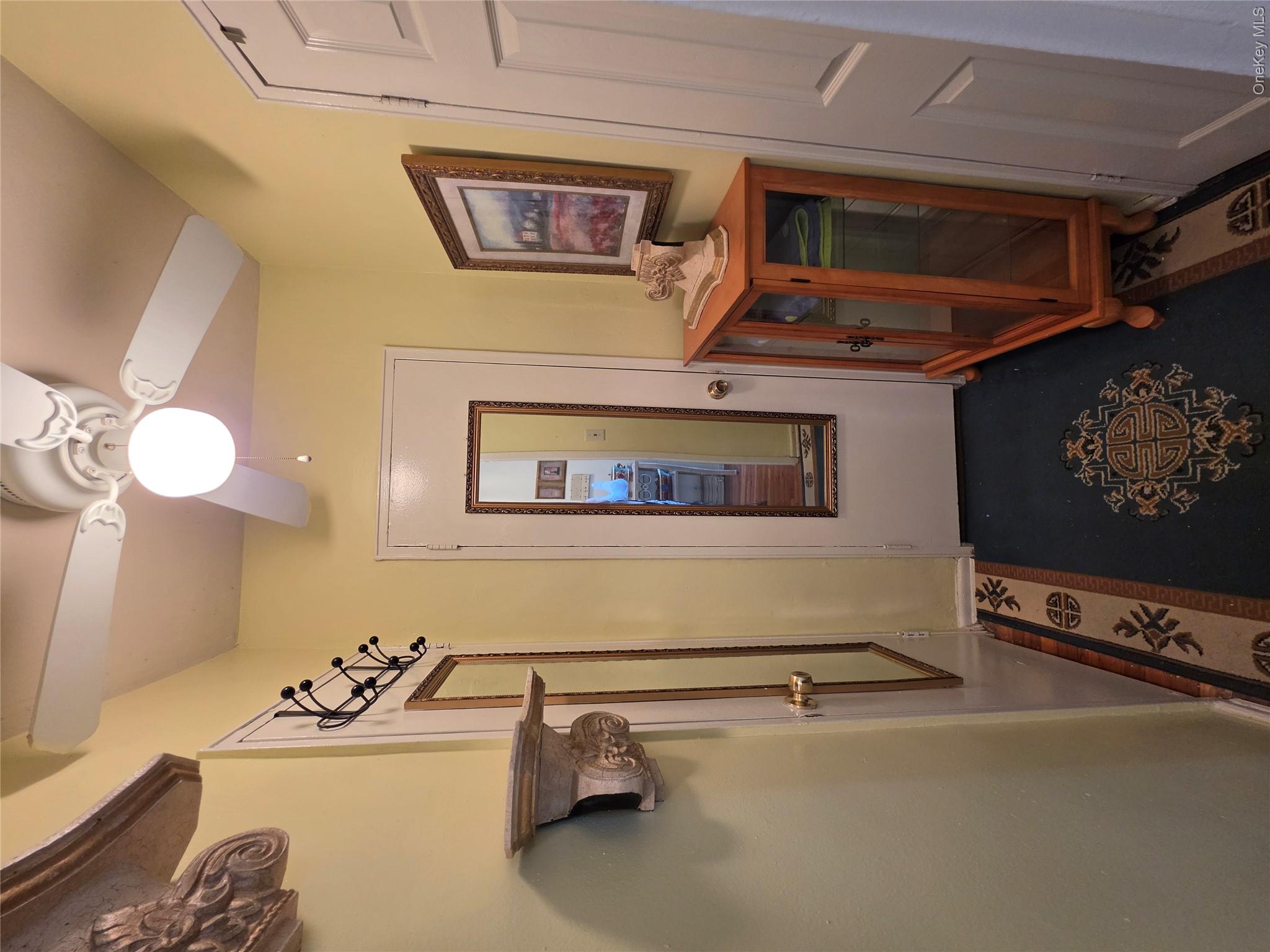 129 Beach 118th Street, Unit 5A Queens, NY 11694 - Photo 7 of 17 a view of entryway with wooden floor