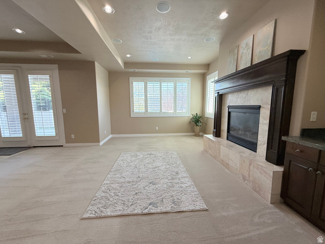 1562 Fairway Ridge Road Draper, UT 84020 - Photo 40 of 60 Spacious living area featuring a built-in fireplace with a dark wood mantle and a tile surround