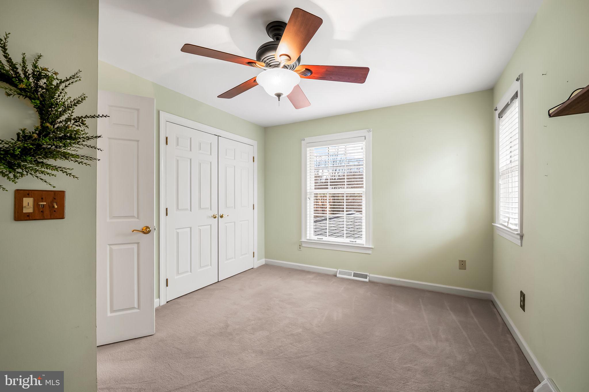 2202 Aquilas Delight Fallston, MD 21047 - Photo 16 of 35 an empty room with ceiling fan and window