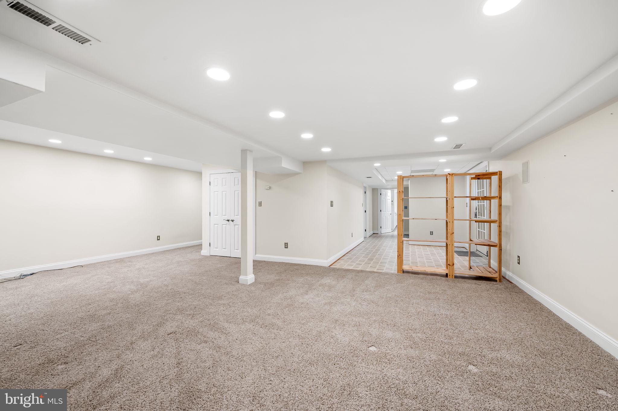 2202 Aquilas Delight Fallston, MD 21047 - Photo 19 of 35 an empty room with windows and refrigerator