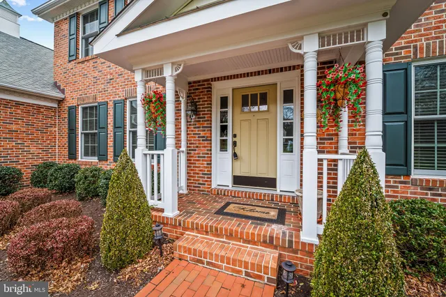 front view of a house with a rug