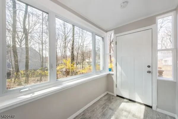 a kitchen with a sink cabinets and window