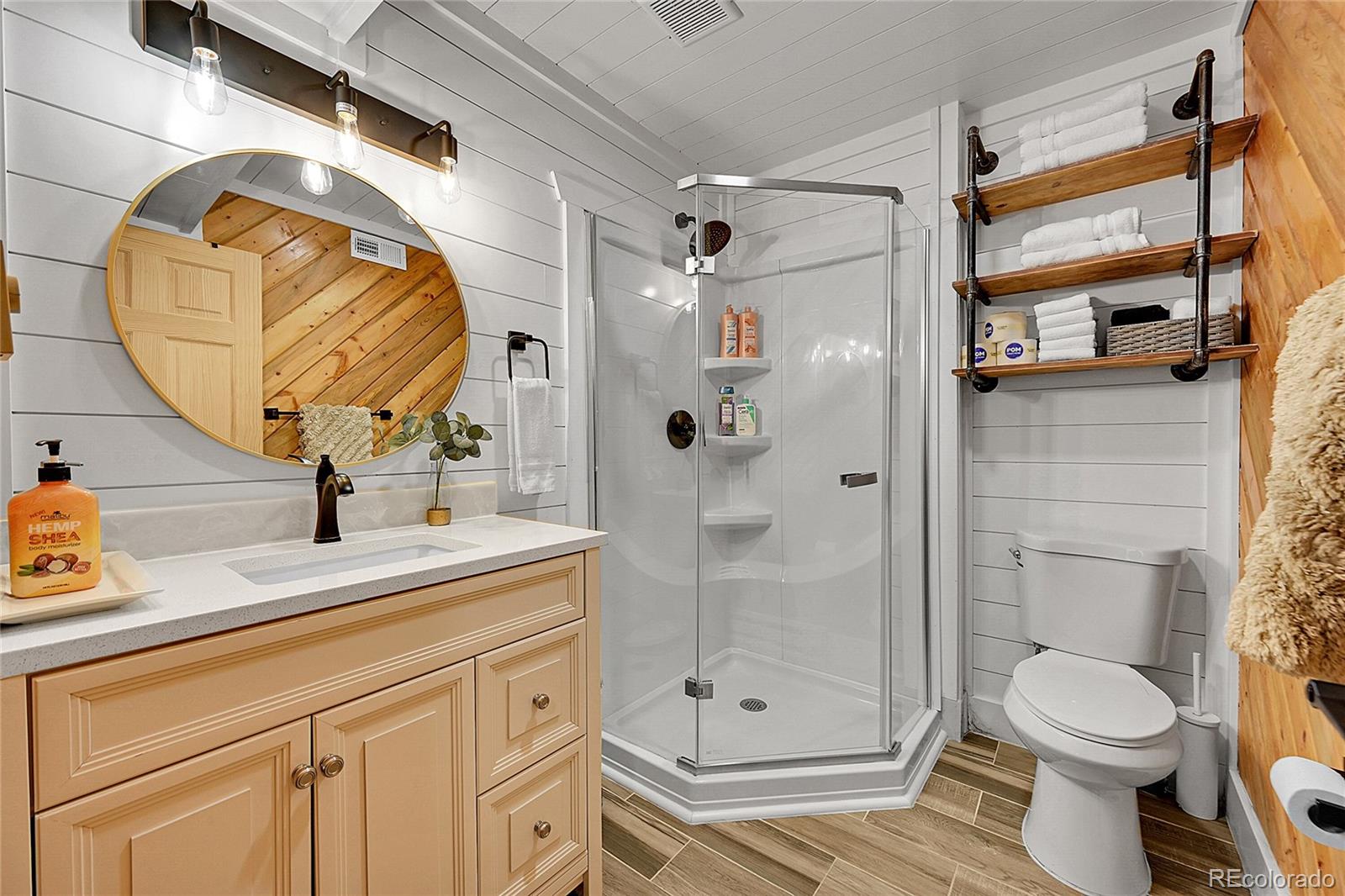 3645 Stanley Road Dumont, CO 80436 - Photo 19 of 39 a bathroom with a sink a toilet and shower