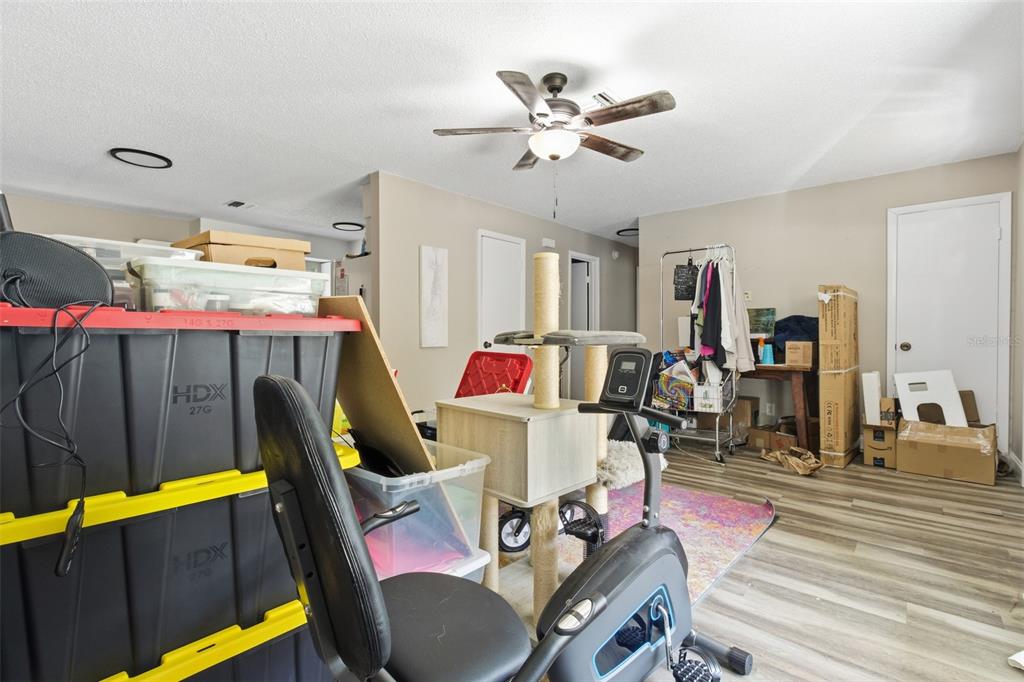 150 South Rooks Avenue Inverness, FL 34453 - Photo 11 of 30 a living room with furniture and a gym equipment