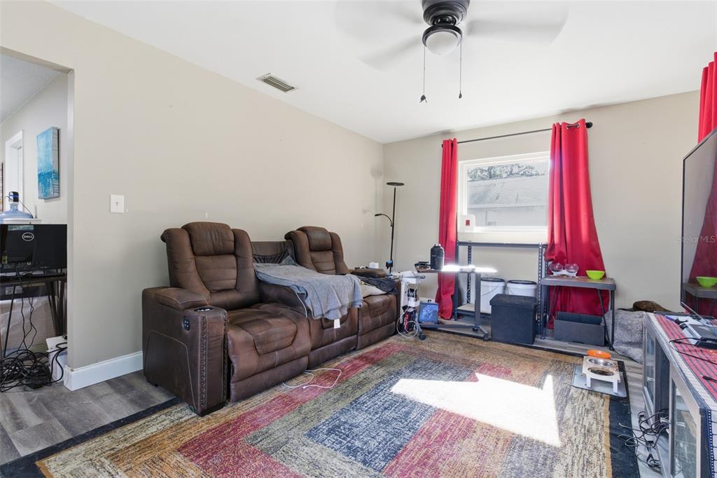 150 South Rooks Avenue Inverness, FL 34453 - Photo 21 of 30 a bedroom with furniture and a window