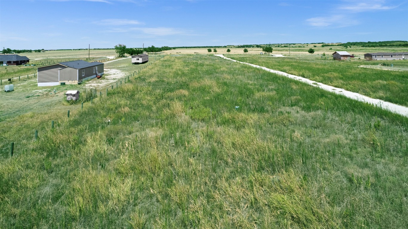 15821 Giese Lane Elgin, TX 78621 - Photo 11 of 19 a view of a lake with a yard
