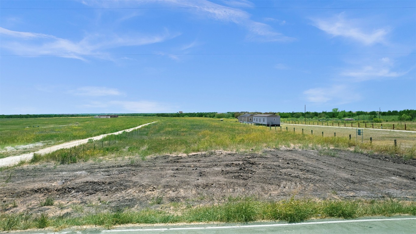 15821 Giese Lane Elgin, TX 78621 - Photo 13 of 19 a view of a lake with a yard