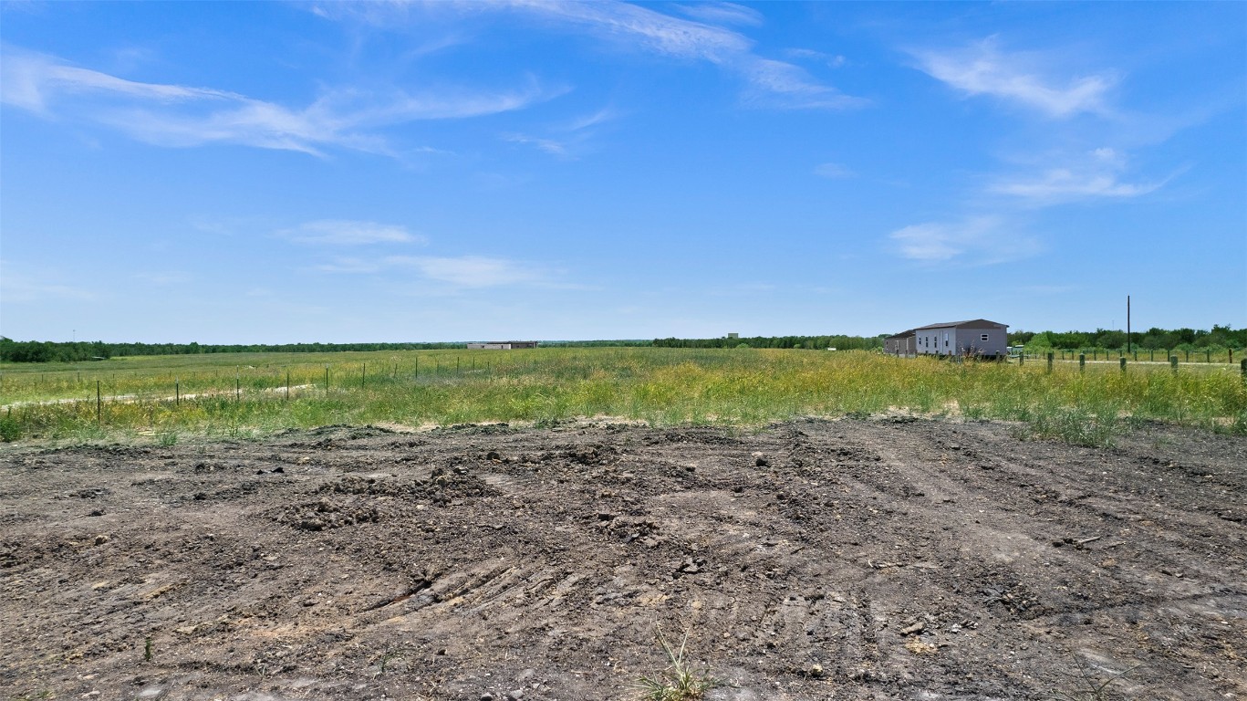 15821 Giese Lane Elgin, TX 78621 - Photo 14 of 19 a view of an ocean beach