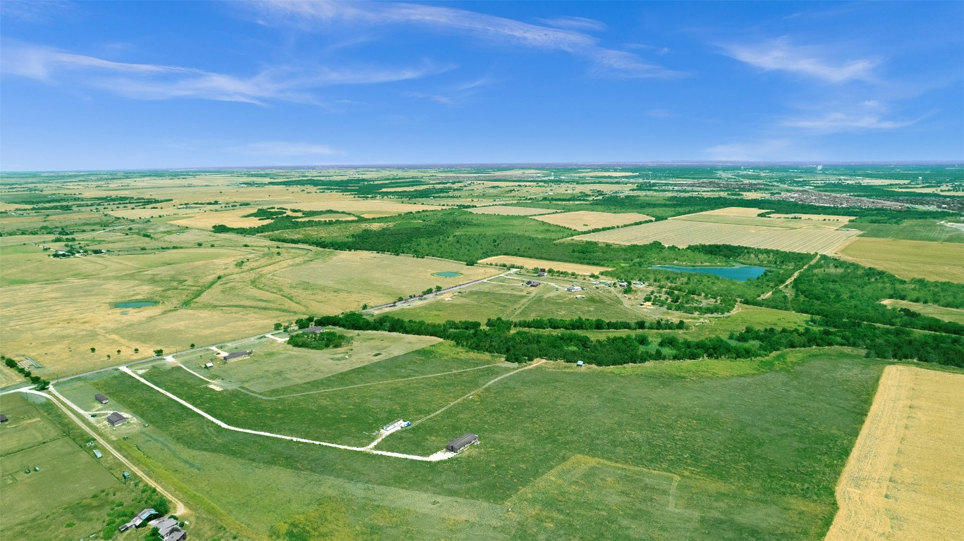 15821 Giese Lane Elgin, TX 78621 - Photo 5 of 19 a view of an ocean and beach