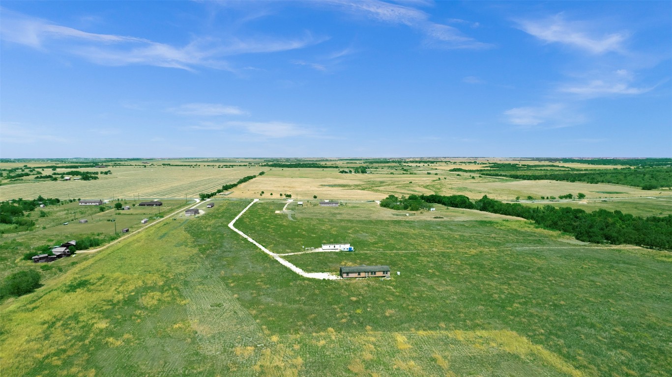 15821 Giese Lane Elgin, TX 78621 - Photo 6 of 19 a view of a field with an ocean