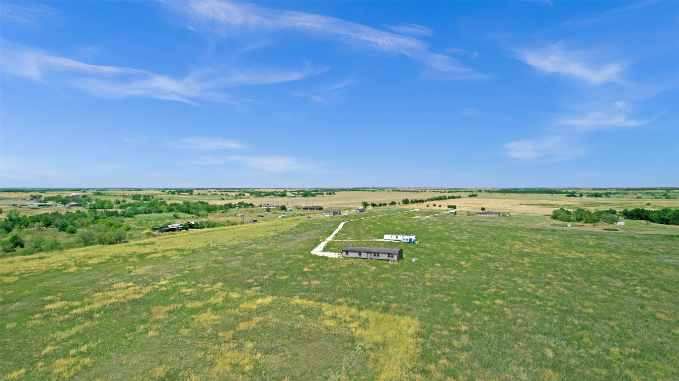 15821 Giese Lane Elgin, TX 78621 - Photo 7 of 19 a view of a field with an ocean