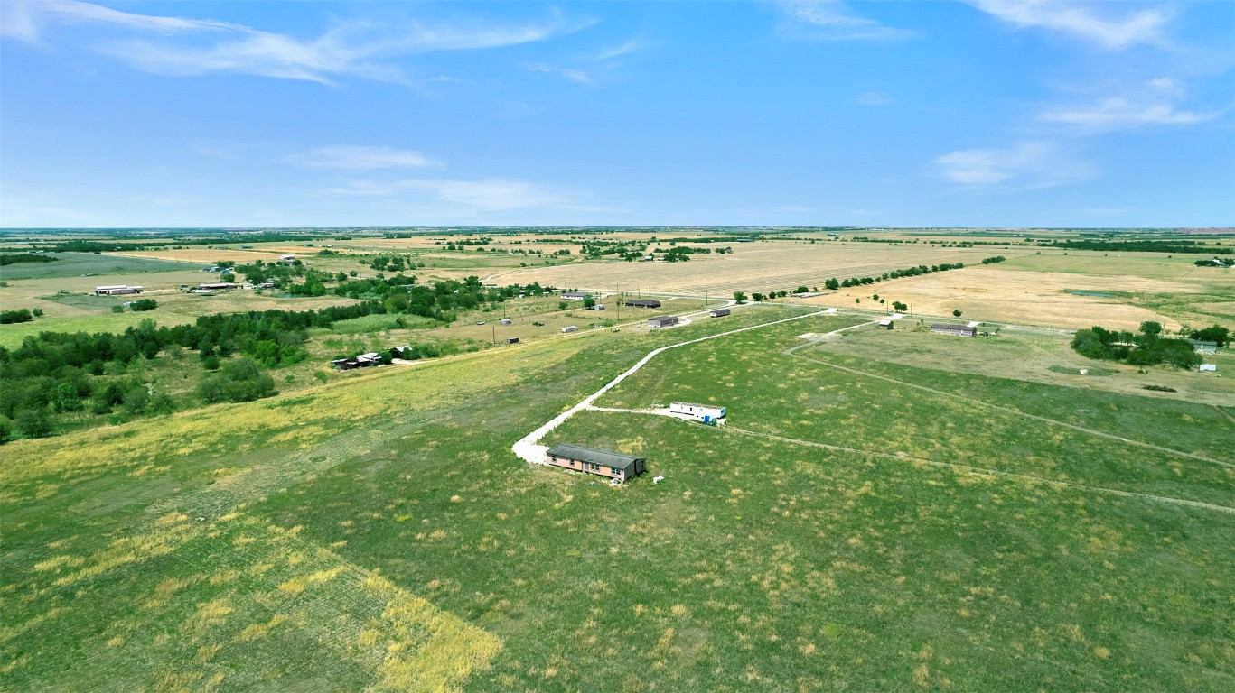 15821 Giese Lane Elgin, TX 78621 - Photo 8 of 19 a view of a field with an ocean