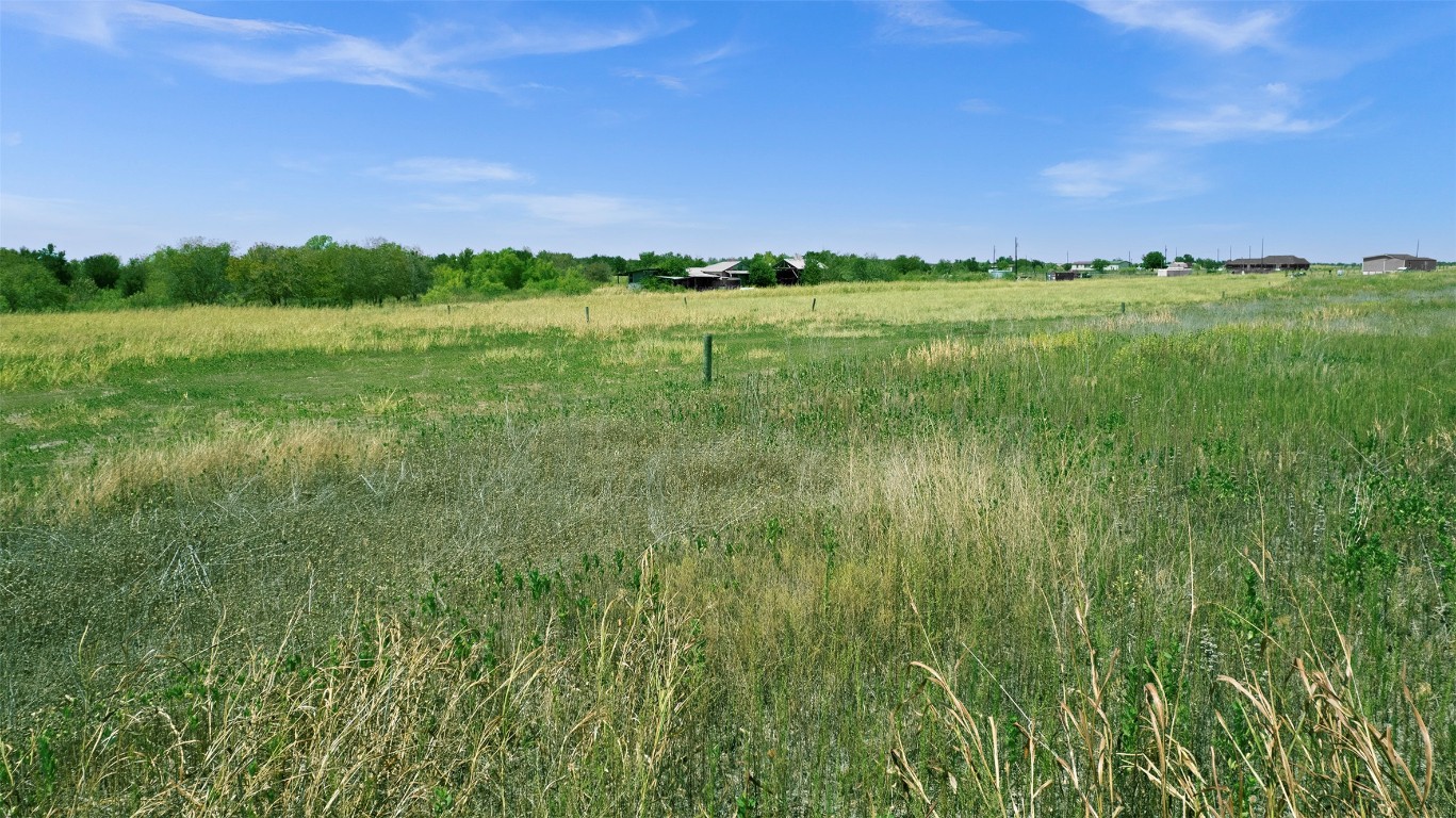 15821 Giese Lane Elgin, TX 78621 - Photo 9 of 19 a view of a lake with a big yard