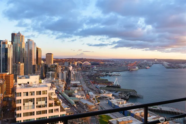 a view of a city with tall buildings