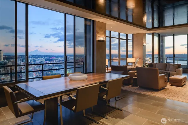 a view of a dining room with furniture window and outside view