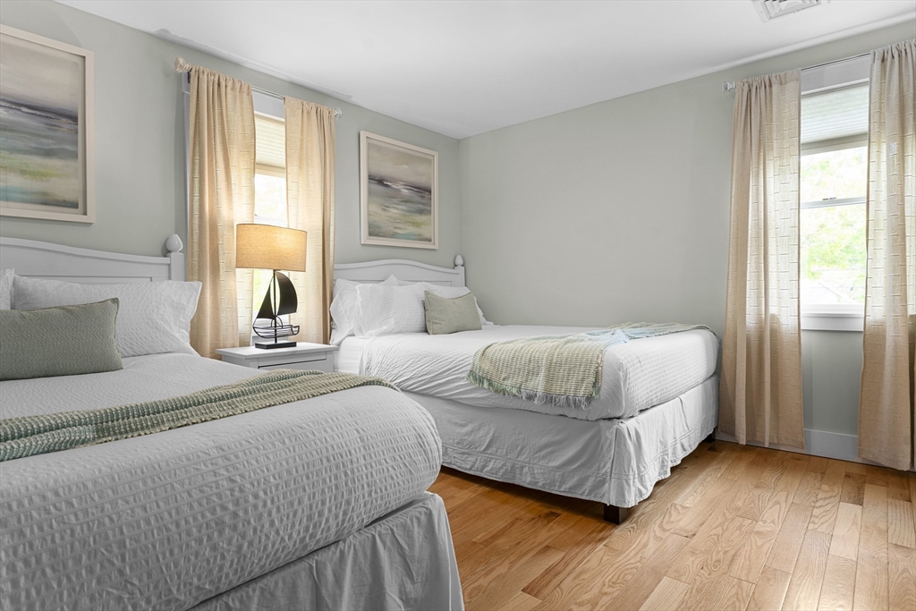 4 Hye Lane Edgartown, MA 02539 - Photo 13 of 41 a bedroom with a bed and window