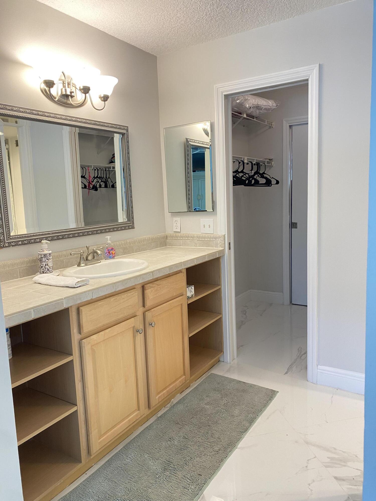 2 Royal Palm Way, Unit 101 Boca Raton, FL 33432 - Photo 14 of 24 Primary Bedroom w/Walk-in Closet