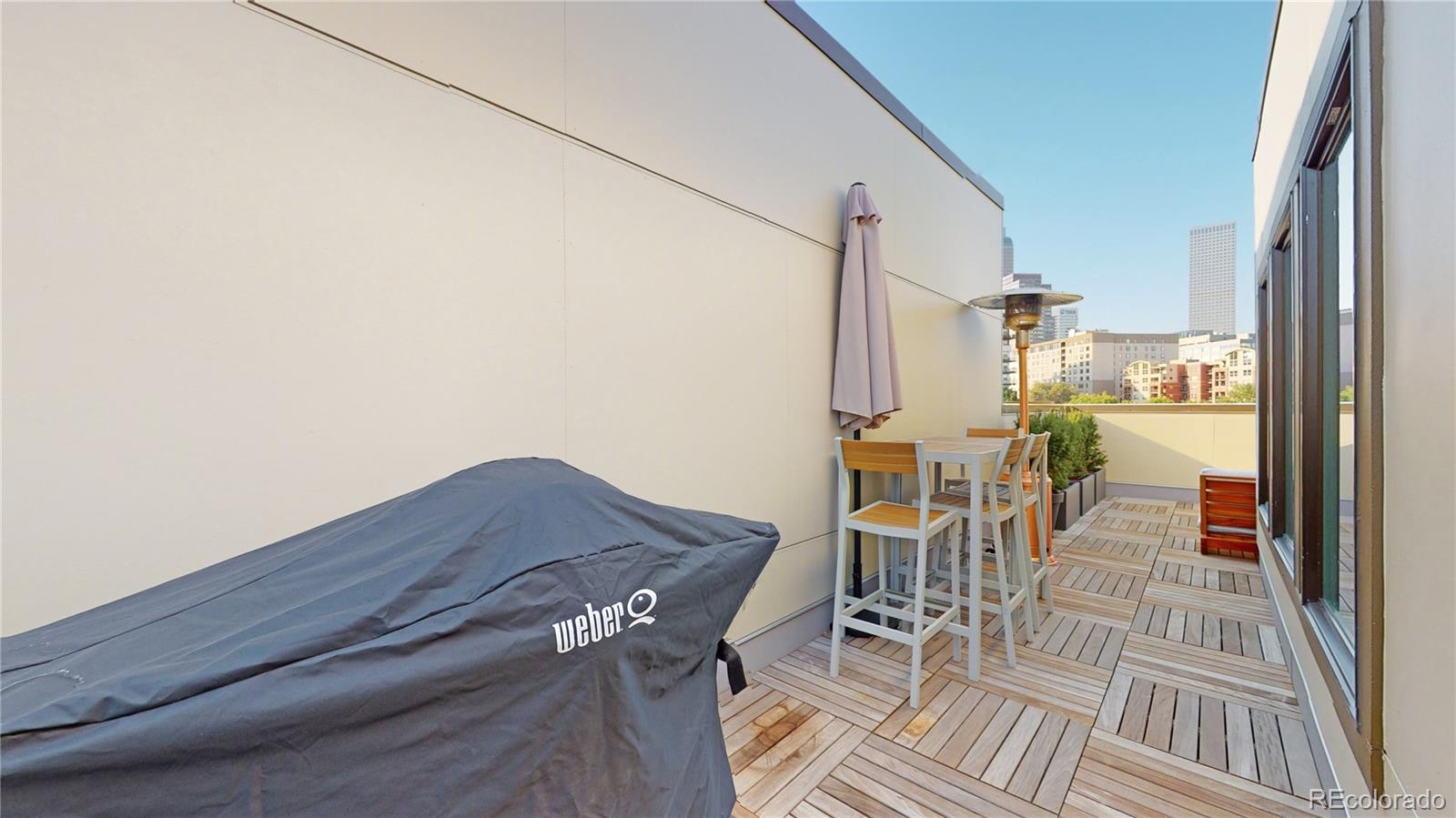 385 22nd Street, Unit 4 Denver, CO 80205 - Photo 26 of 40 a view of dining room and wooden floor