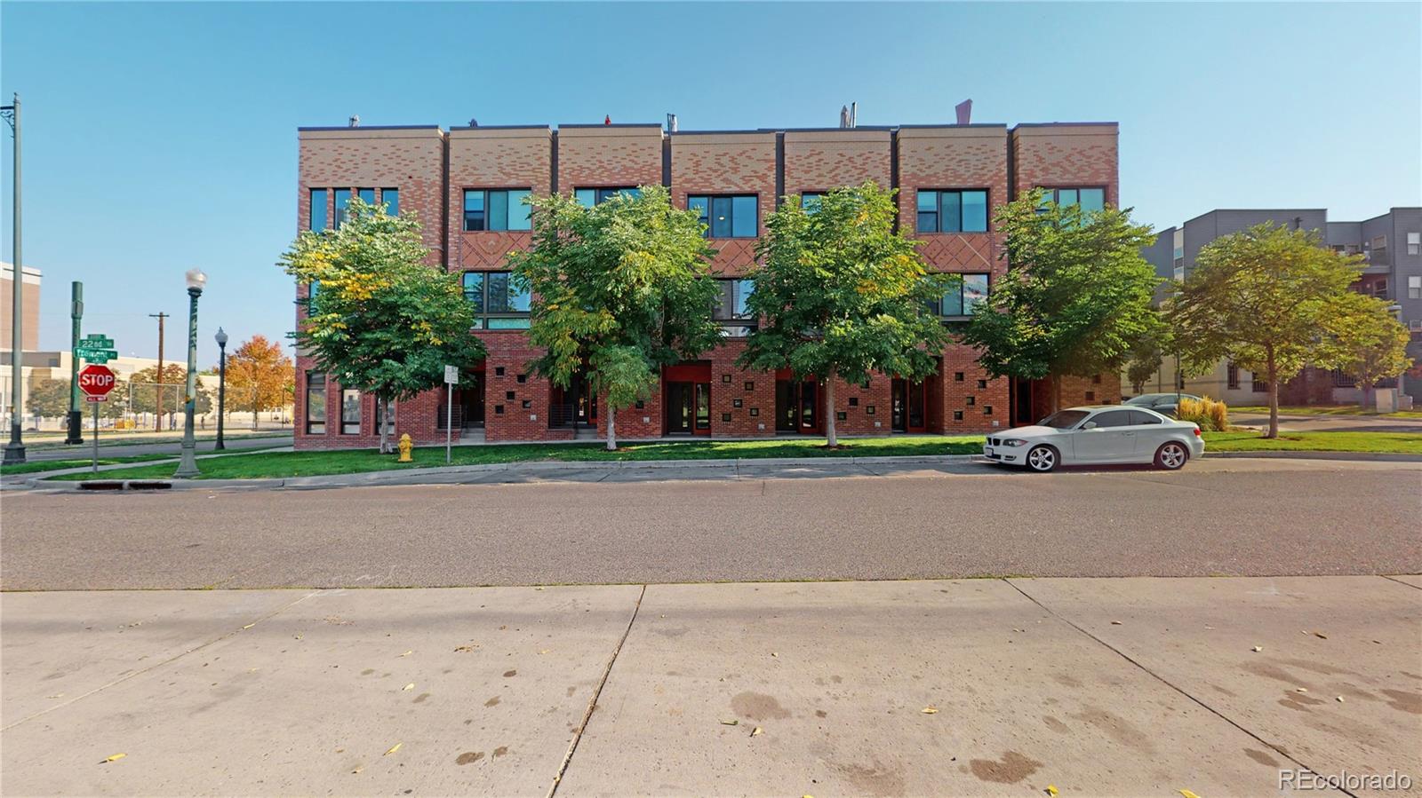385 22nd Street, Unit 4 Denver, CO 80205 - Photo 30 of 40 a view of a car parked in front of a building