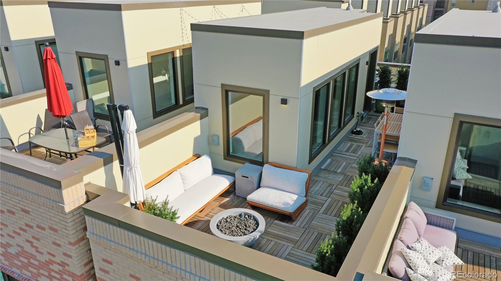 385 22nd Street, Unit 4 Denver, CO 80205 - Photo 36 of 40 a view of living room with furniture and a flat screen tv