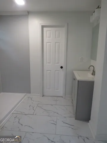 a bathroom with a bathtub