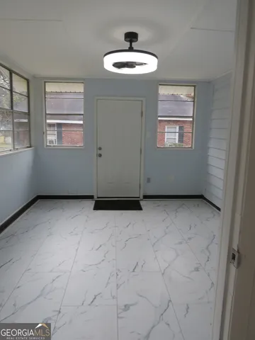 a view of a room with a window