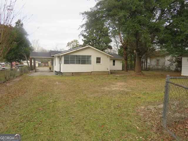 a house view with a swimming pool