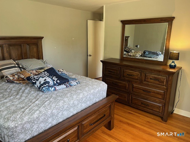 6 Cricket Drive Meriden, CT 06450 - Photo 11 of 33 a bedroom with a bed and a mirror on dresser